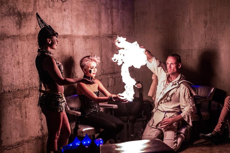 A theatrical portrait encounter with performers and fire
